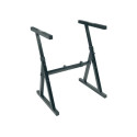 Soporte/base para teclado. Color negro. Forma en ?Z?